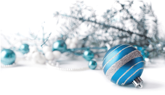 A variety of blue and sliver Christmas ball decorations.