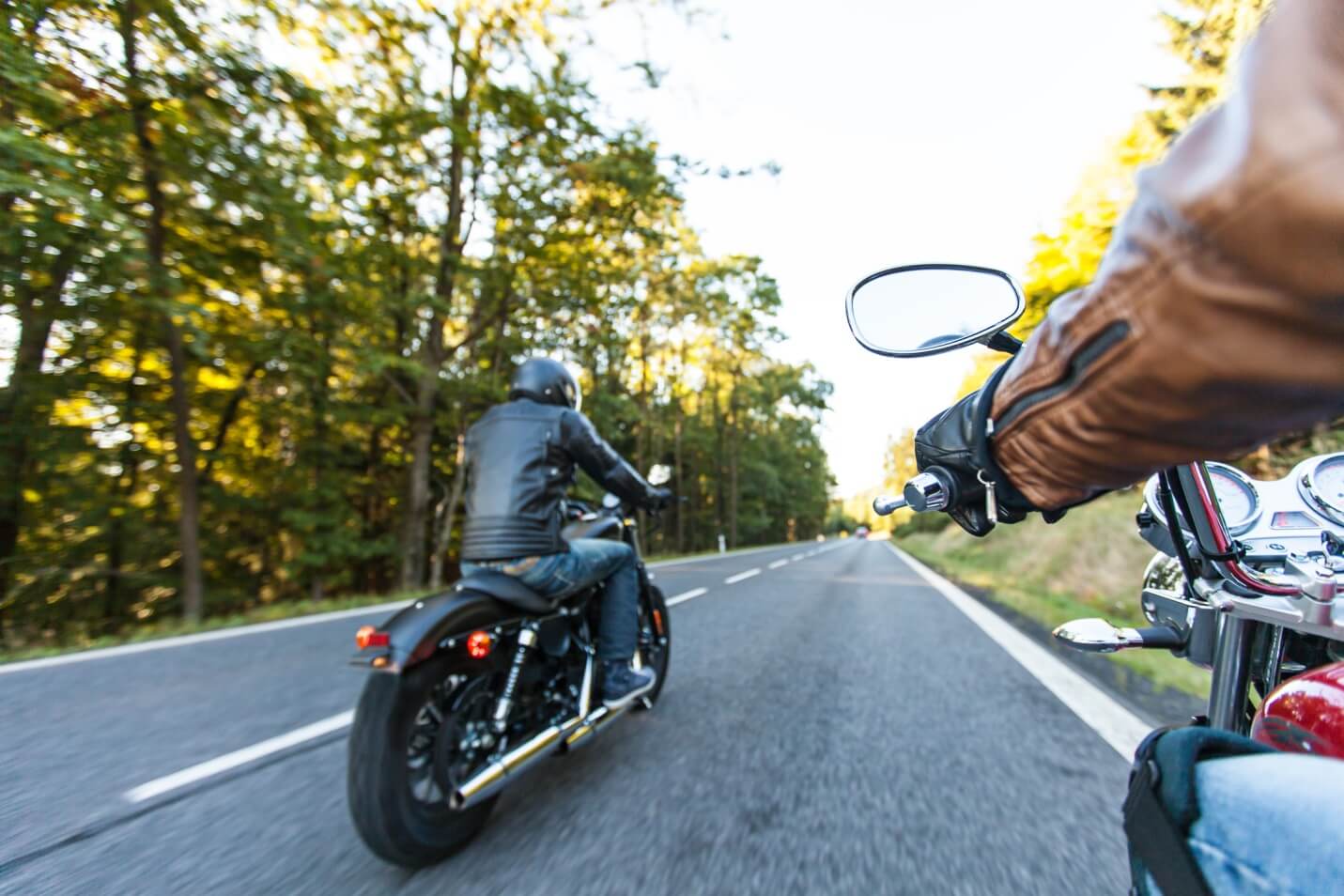 Two motorcycle riders.