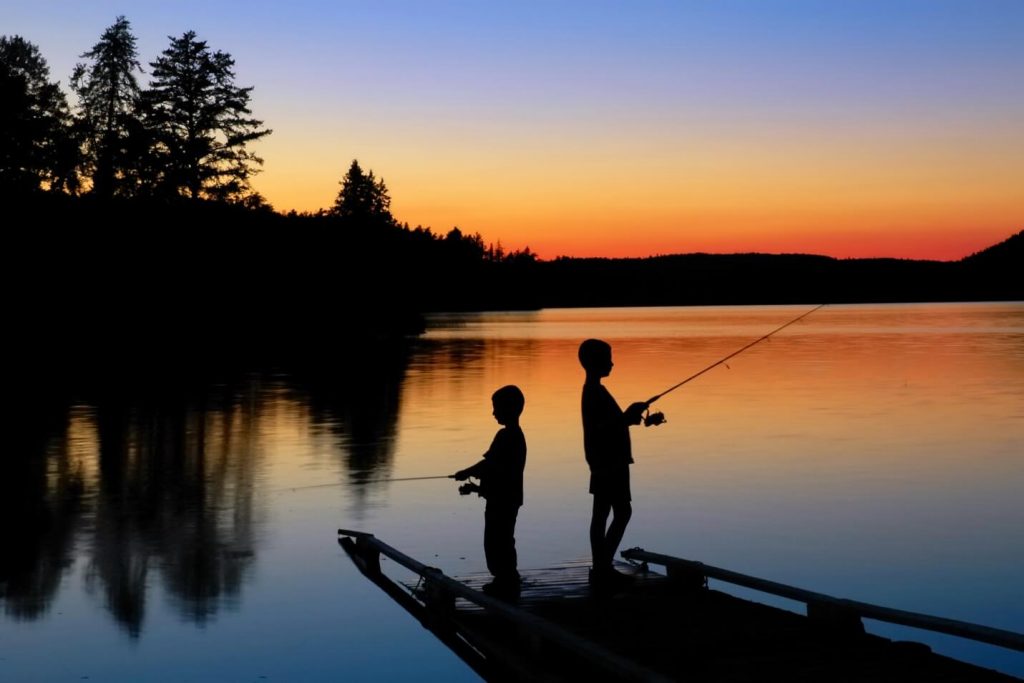 Two kids fishing.