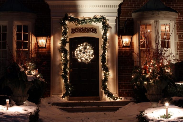 A front door with Christmas decor