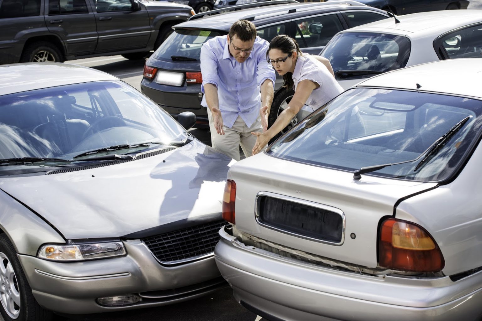 two cars that appear to have been in an accident