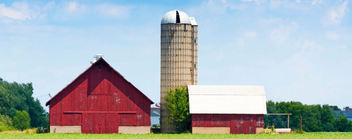 Red farm buildings.