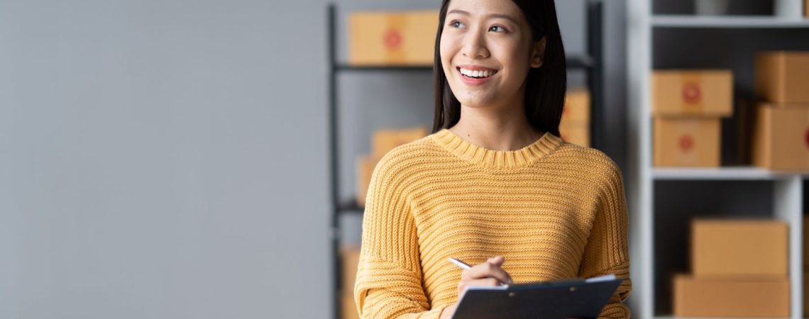 woman updating her home inventory list for home insurance