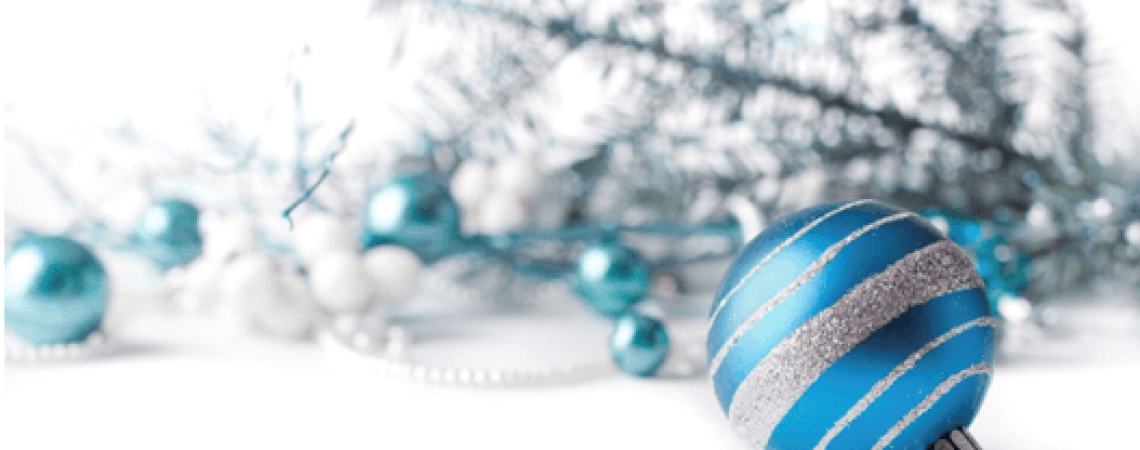 A variety of blue and sliver Christmas ball decorations.