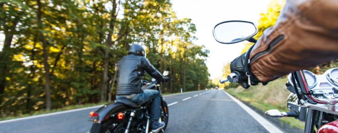 Two motorcycle riders.